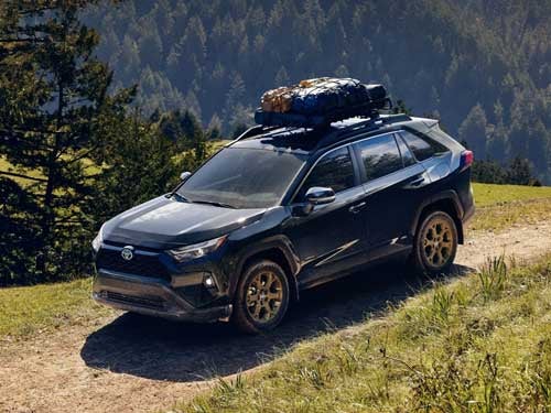 2024 Toyota RAV4 Hybrid off-roading with camping gear