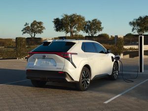 2026 Toyota bZ Electric SUV parked charging up.