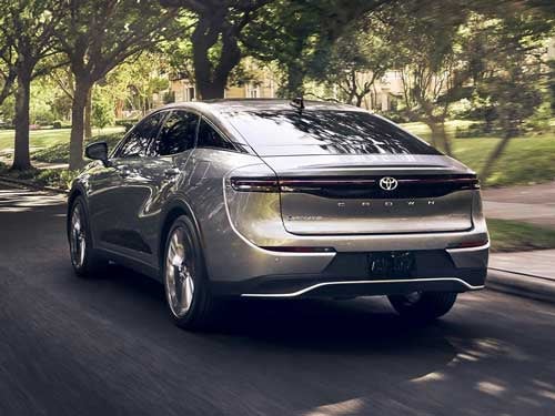 gray 2025 Toyota Crown driving down the road