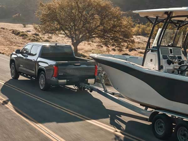 2025 Toyota Tundra towing a boat